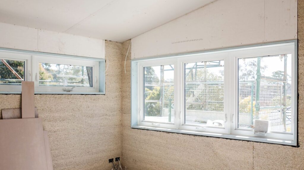 Image shows hempcrete under construction. 
