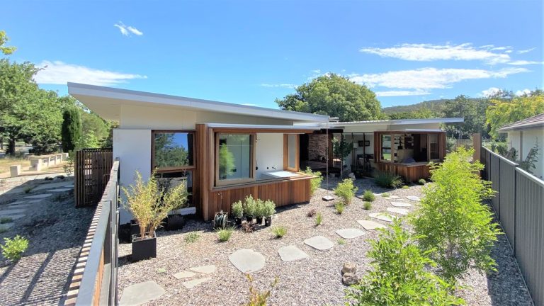 Image shows an architectural courtyard style home.